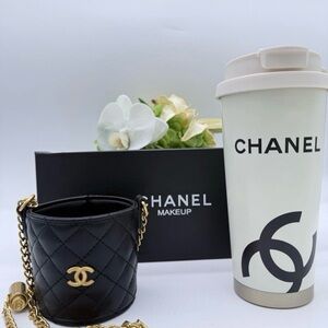 CHANEL Black Quilted Mini Bucket Bag with Gold CC Hardware